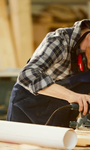 carpenter-polishing-wood.jpg