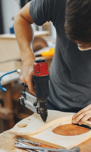 the-carpenter-works-with-a-tree.jpg